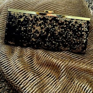 Golden black clutch